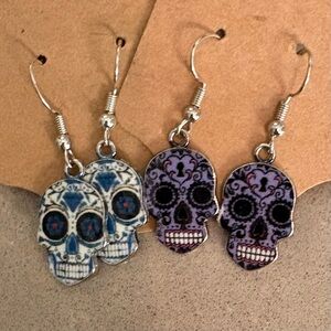Skull Dangle Earrings in Blue and Purple  2 pairs for 8.00 NWOT